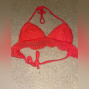 Cute red top bathing suit material like yarn but stronger.